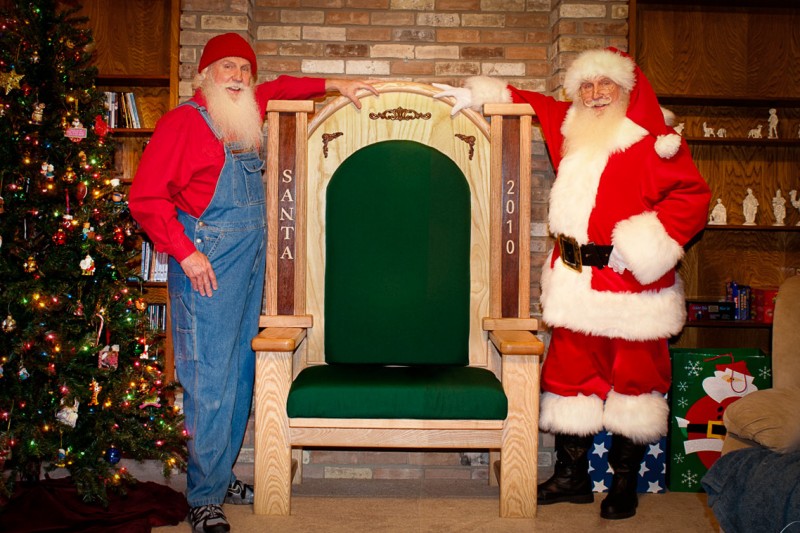 Santa Jim poses with his Builder Brother, Arthur, next to his custom Santa throne.